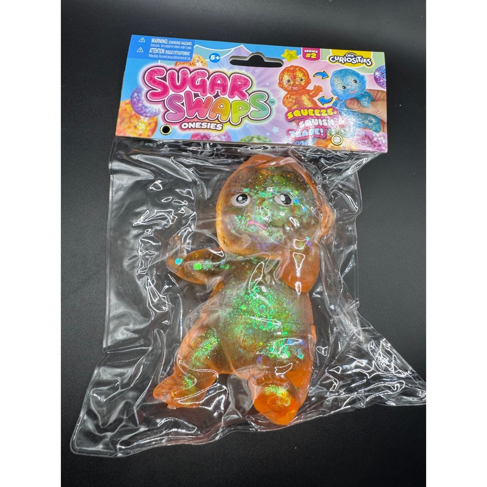 Orb Curiosities Sugar Swaps Onesies Series 2 Orange Glitter Squishy Toy New